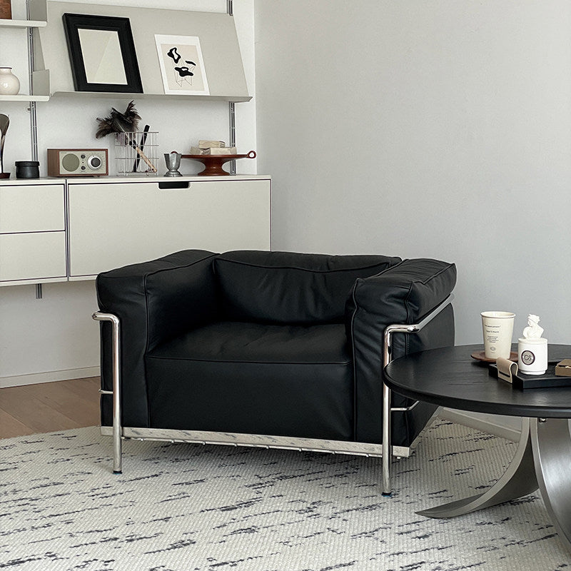 Black Leather-Look Oversized Accent Chair, Deep Box-Cushion Lounge Armchair with External Chrome Tubular Steel Frame for Living Room, Office, Reception Area and Reading Nook