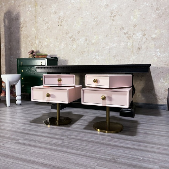 Pink Rotating Nightstand with 2 Drawers and Gold Pedestal