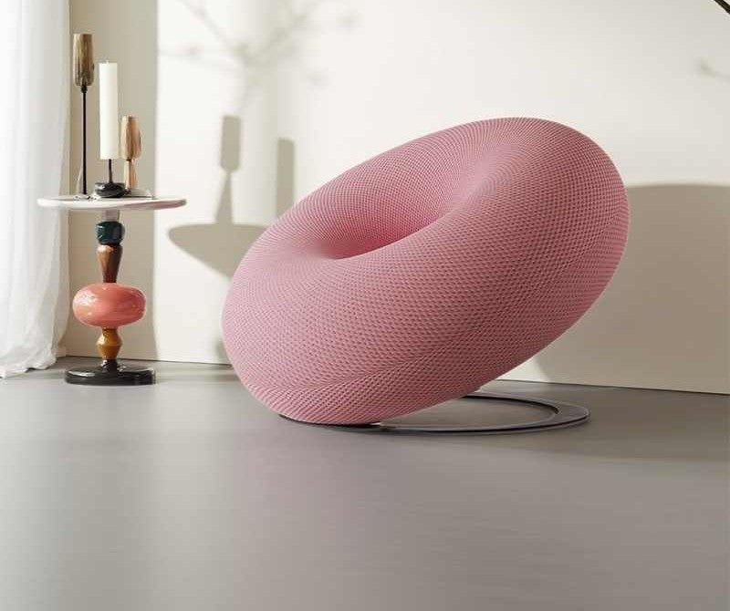 Craftsmanship Designer Donut Chair with Textured Pink Fabric, Modern Minimalist Swivel Accent Chair for Living Room & Bedroom