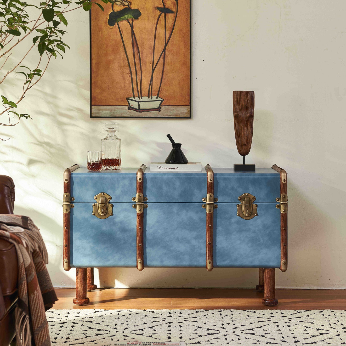 Vintage French Steamer Trunk Console Table – Distressed Blue Leather & Brass Hardware Storage Trunk on Wooden Legs, Classic Travel-Inspired Furniture