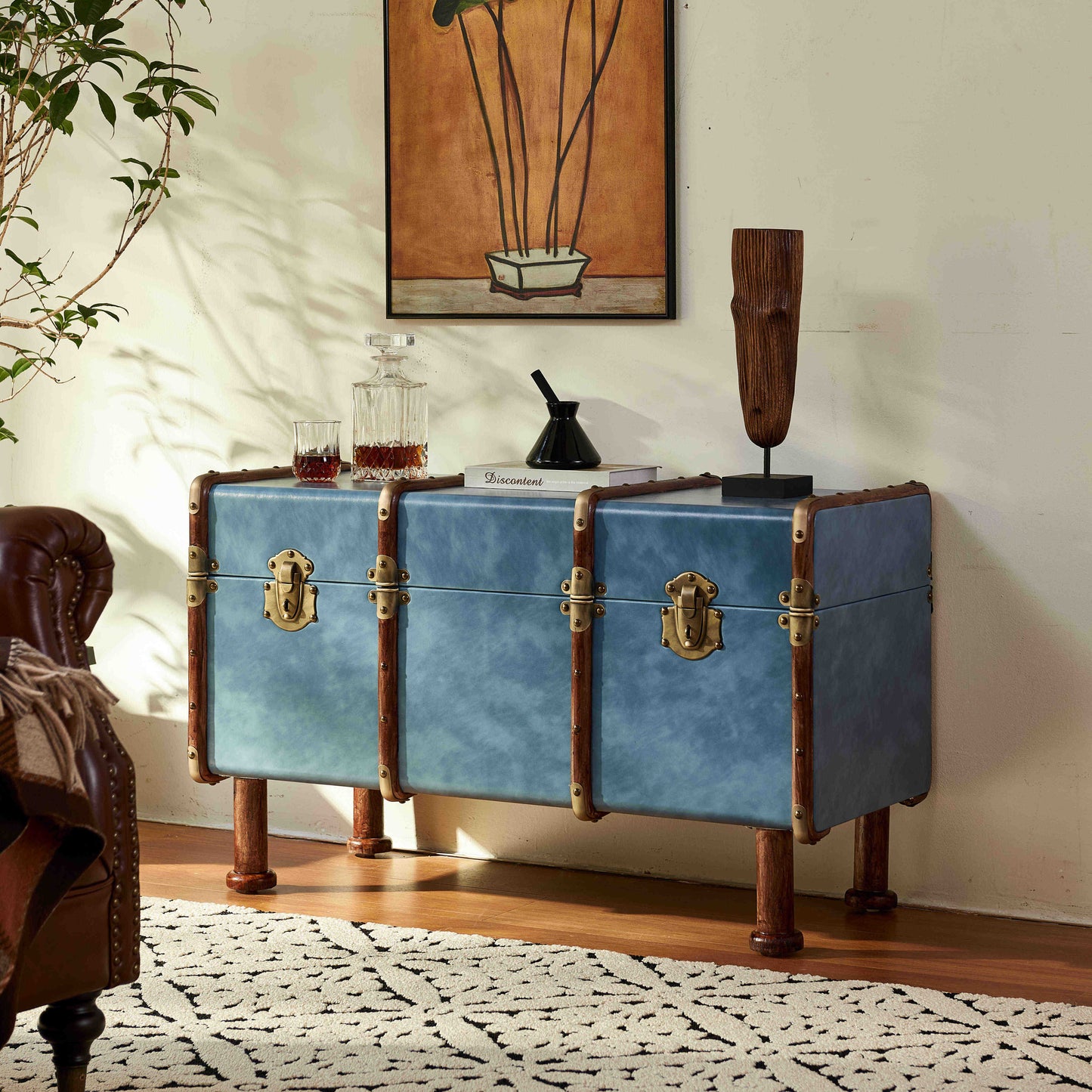 Vintage French Steamer Trunk Console Table – Distressed Blue Leather & Brass Hardware Storage Trunk on Wooden Legs, Classic Travel-Inspired Furniture