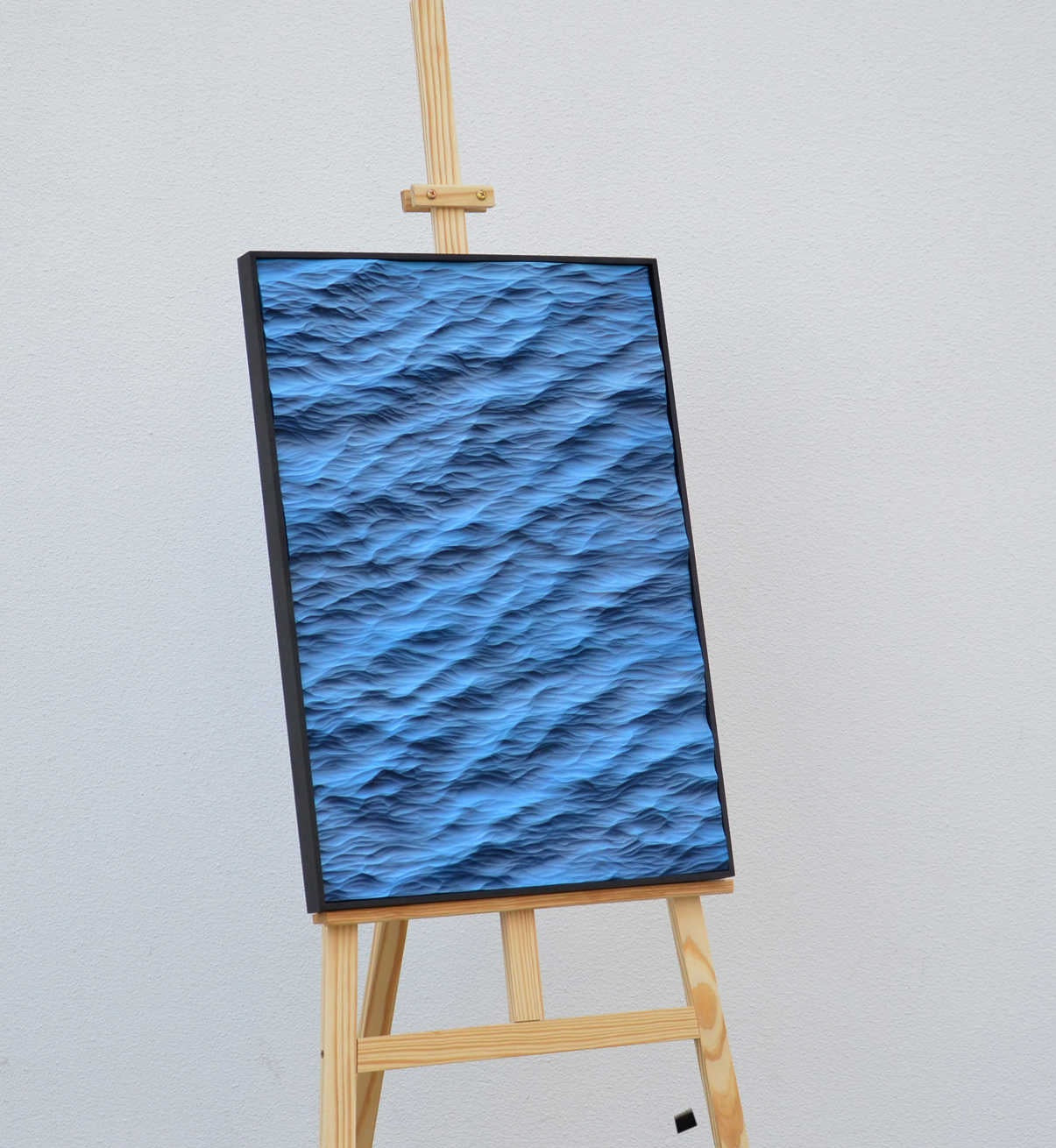Modern 3D Ocean Wave Relief Wall Art, Blue Embossed Minimalist Painting with Black Solid Wood Frame, Unique Style for Living Room Décor