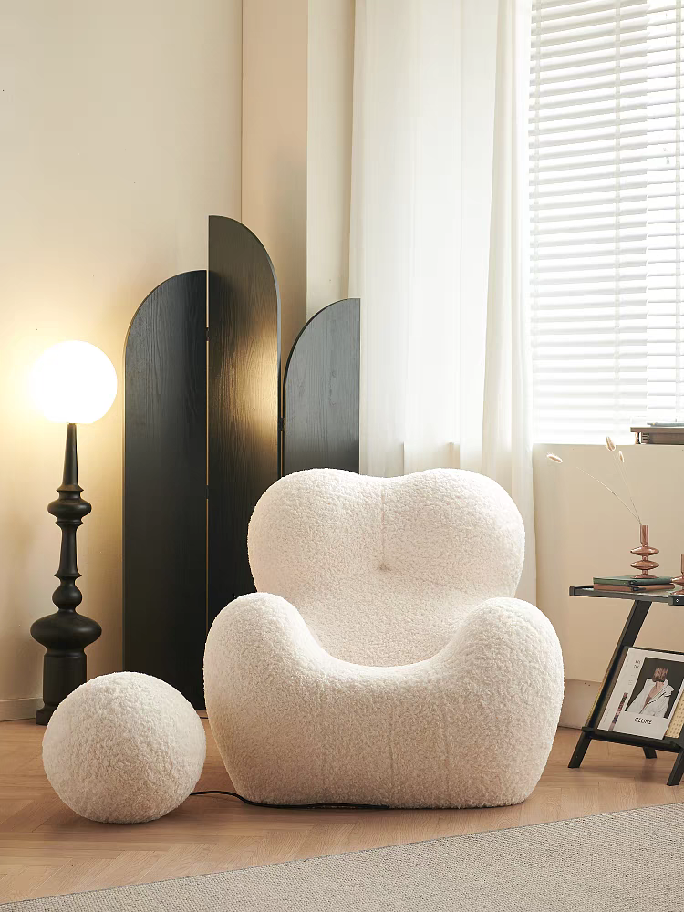 The Up chair Lamb Faux Fur super comfortable lounge chair with ottoman