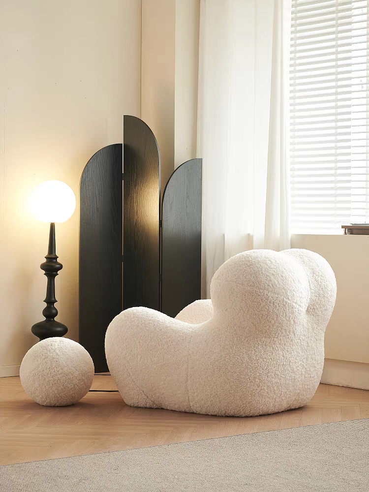 The Up chair Lamb Faux Fur super comfortable lounge chair with ottoman