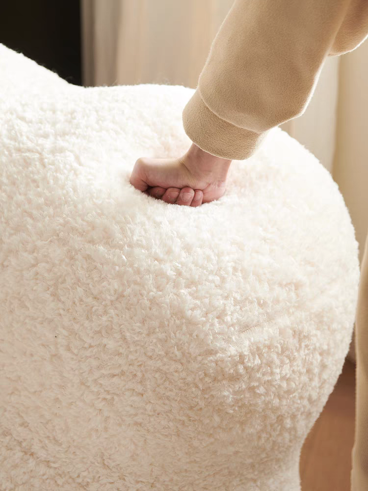 The Up chair Lamb Faux Fur super comfortable lounge chair with ottoman