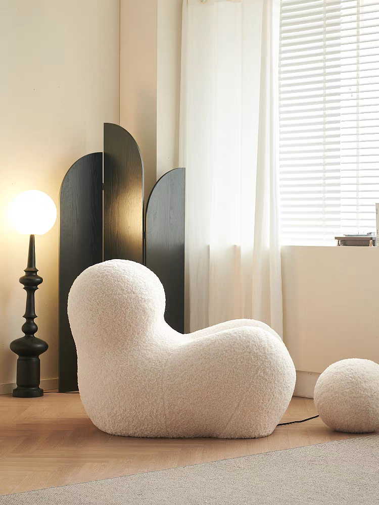 The Up chair Lamb Faux Fur super comfortable lounge chair with ottoman
