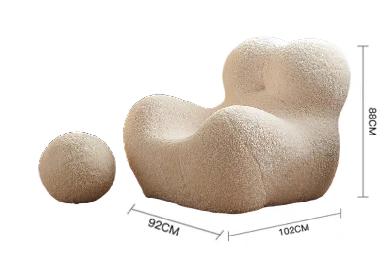 The Up chair Lamb Faux Fur super comfortable lounge chair with ottoman