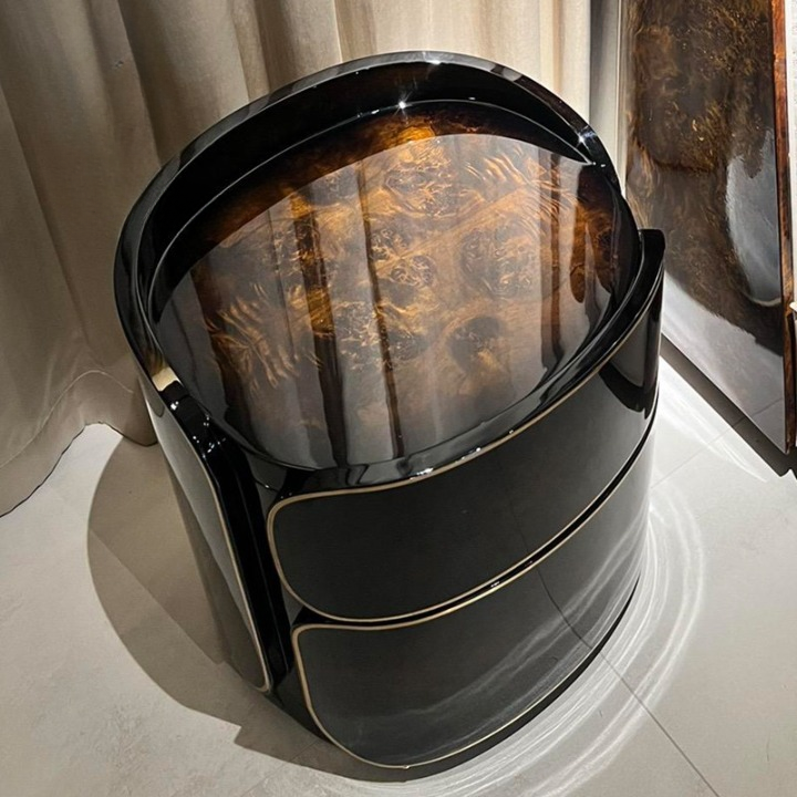 Modern Black 2-Drawer Nightstand with Curved Frame and Gold Trim