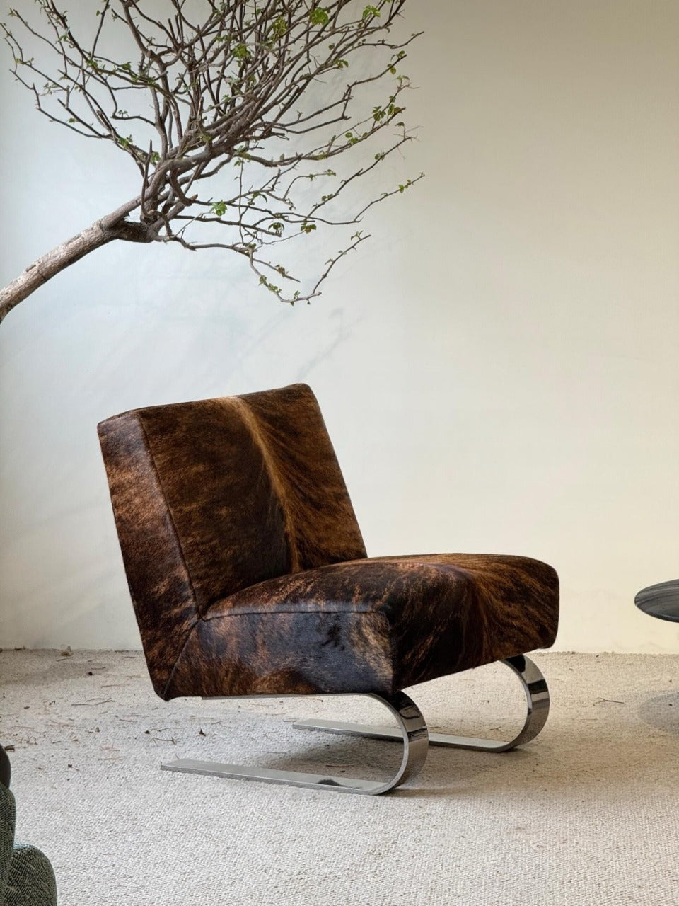 Modern Hair-On Hide Accent Chair with Stainless Steel Sled Base, Low Profile Lounge Chair for Living Room, Bedroom, Reading Nook and Office, Black Brown