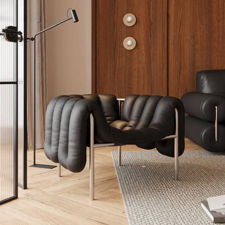 Black Faux Leather Accent Chair, Sculptural Channel-Tufted Lounge Chair with Deep Sling Seat and Black Stainless Steel Frame for Living Room, Bedroom, Office and Reading Nook