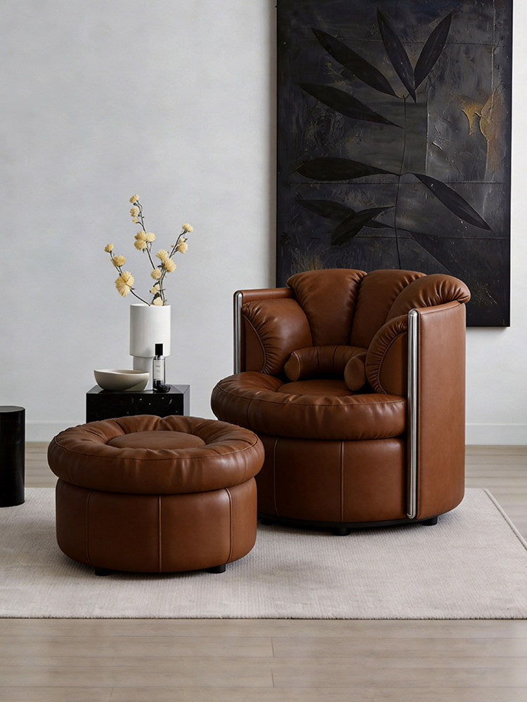 Brown Swivel Lounge Chair with Ottoman and Tufted Upholstery
