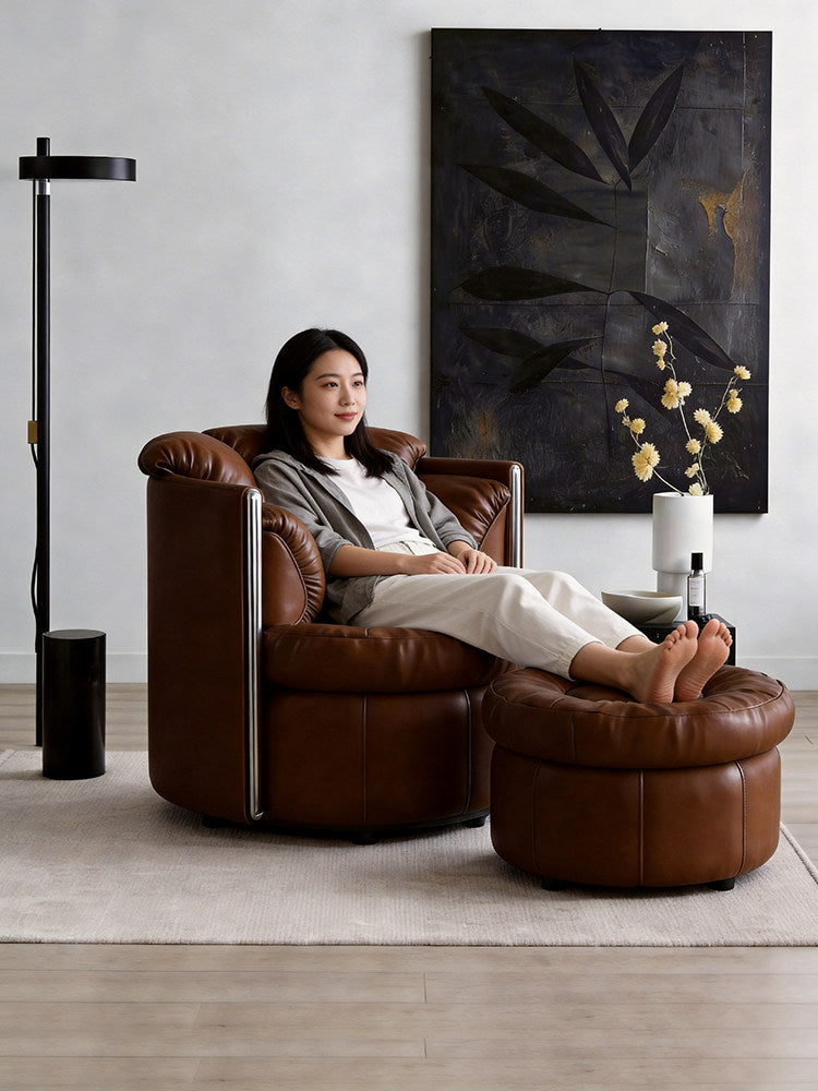 Brown Swivel Lounge Chair with Ottoman and Tufted Upholstery
