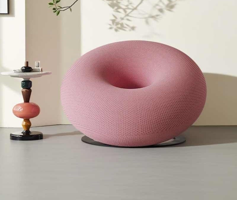 Craftsmanship Designer Donut Chair with Textured Pink Fabric, Modern Minimalist Swivel Accent Chair for Living Room & Bedroom